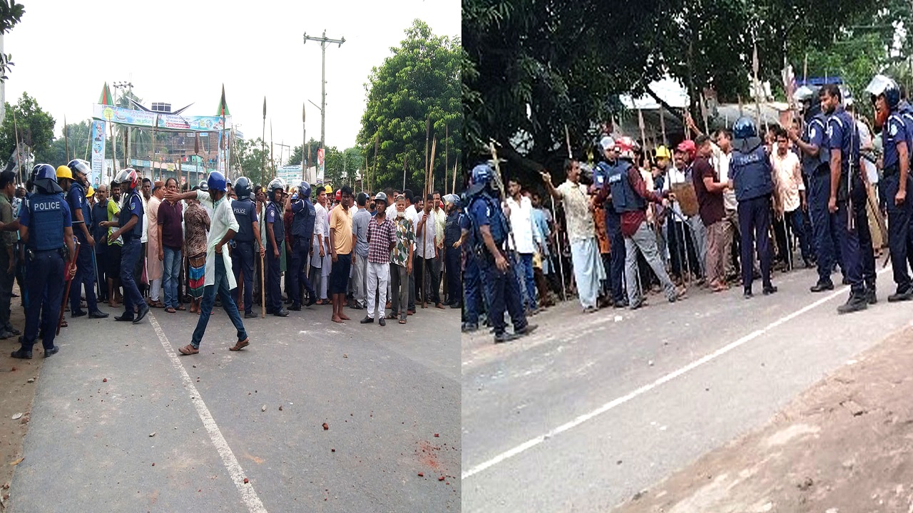 নান্দাইলে বর্তমান ও সাবেক সংসদ সদস্যের দু’গ্রুপের সংঘর্ষের আগ মুহূর্তে নেতাকর্মীদের শান্ত করছেন পুলিশ সদস্যরা। ছবি : কালবেলা