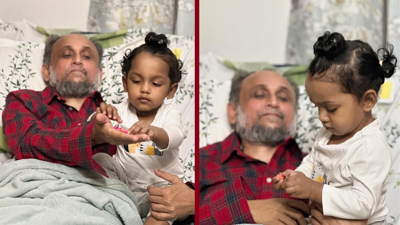 কন্যা ইলহামের সঙ্গে খুনসুটিতে ব্যস্ত মোস্তফা ফারুকী। ছবি : ফেসবুক থেকে