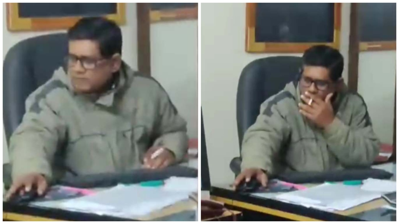 সরকারি অফিসে বসে ধূমপান করছেন ঝালকাঠি নলছিটি উপজেলার হিসাবরক্ষণ কর্মকর্তা মো. আহসান কবীর। ছবি : কালবেলা