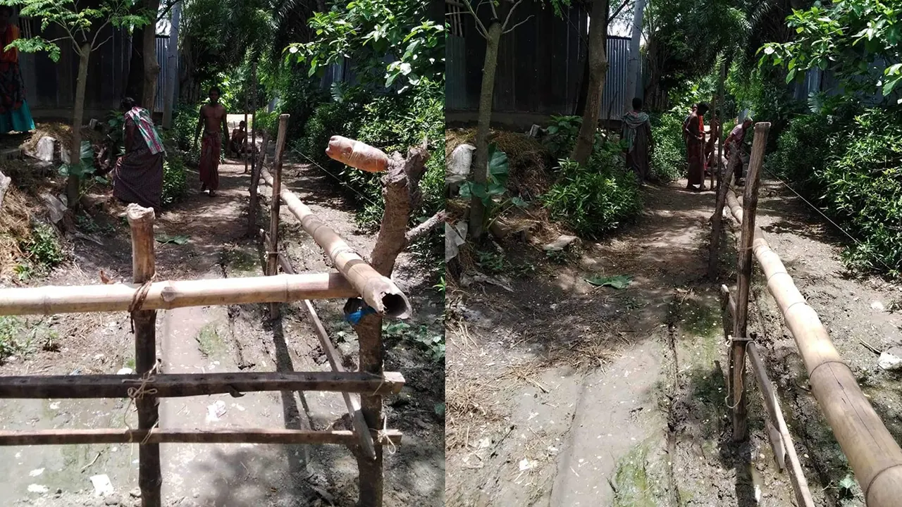 পাবনার চাটমোহরের কাটেঙ্গা গ্রামে রাস্তায় বাঁশের বেড়া দেওয়ায় বাড়ি থেকে বের হতে পারছেন না ২২ পরিবারের লোকজন। ছবি : কালবেলা