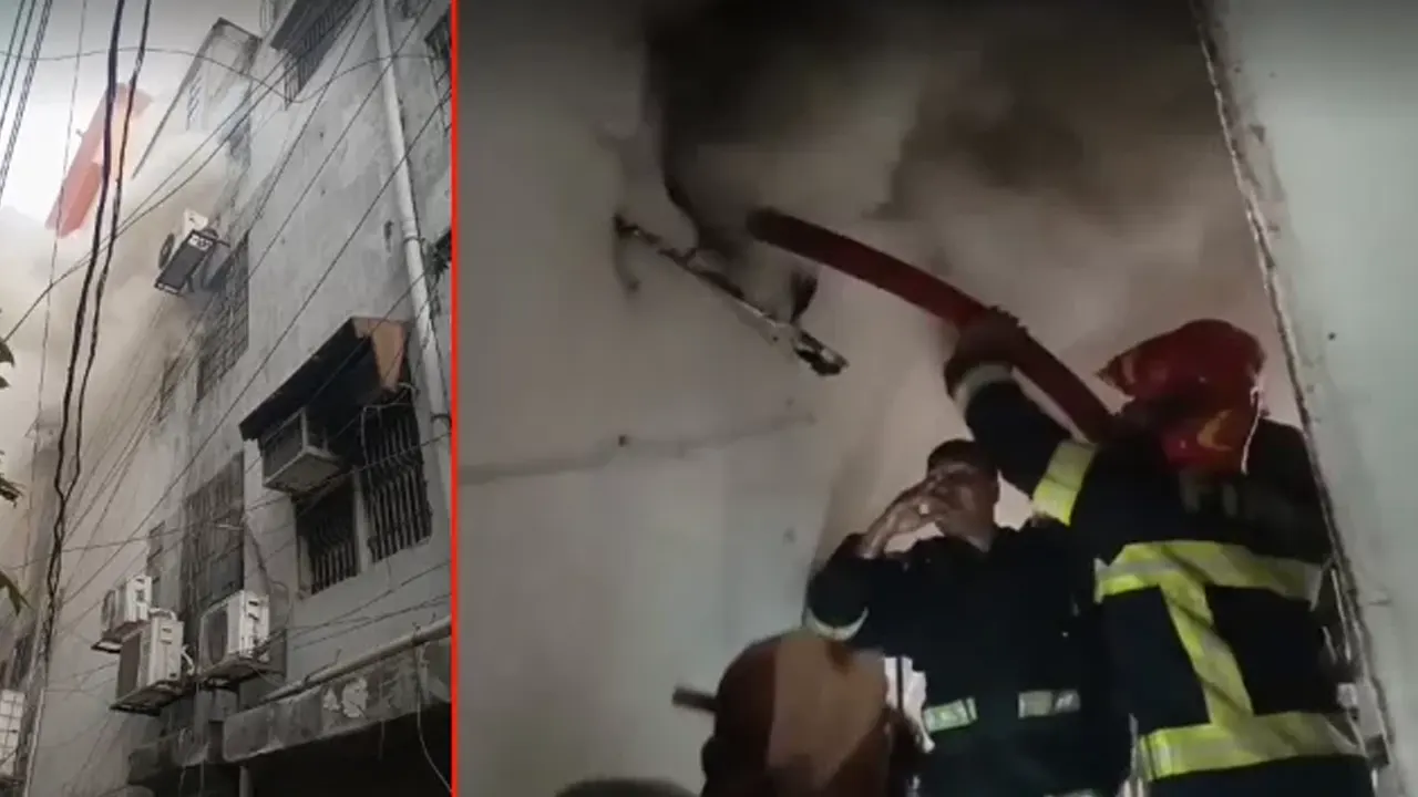 তোপখানা রোডের মানিকগঞ্জ হাউজে ফায়ারকর্মীরা আগুন নিয়ন্ত্রণের চেষ্টা করছেন। ছবি : সংগৃহীত