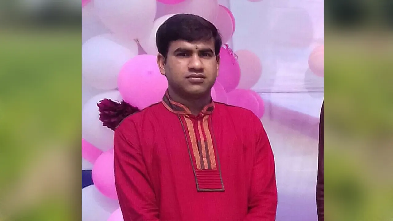 নিহত রাজশাহী বিশ্ববিদ্যালয়ের (রাবি) বাংলা বিভাগের সহযোগী অধ্যাপক ড. পুরনজিত মহালদার। ছবি : সংগৃহীত
