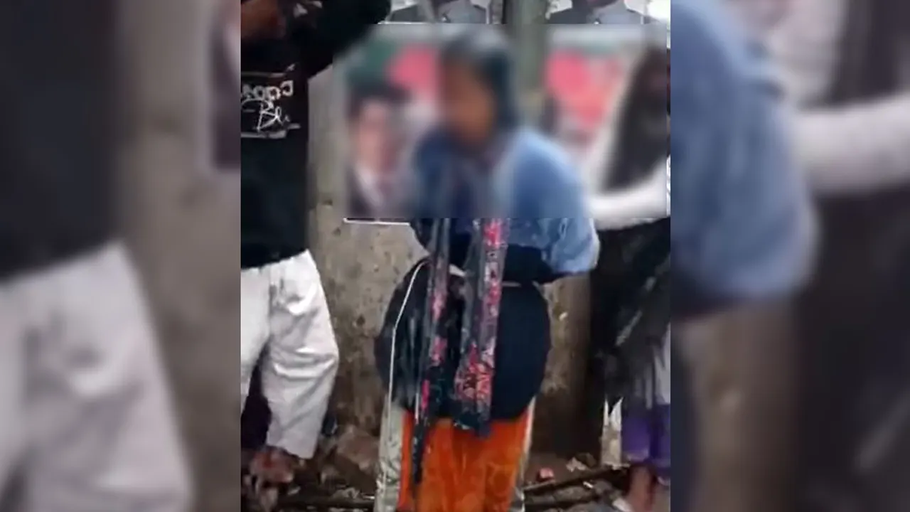 শীতের সকালে নারীকে খুঁটিতে বেঁধে পানি ঢেলে নির্যাতন
